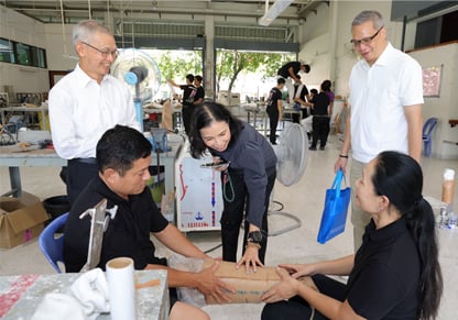 A man tries on his new prosthetic leg. 