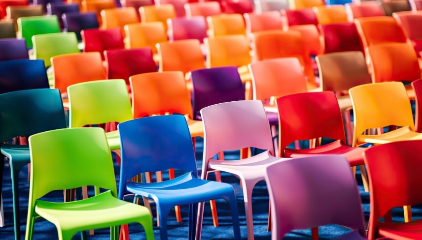 Rows with many colorful, plastic chairs and armchairs.
