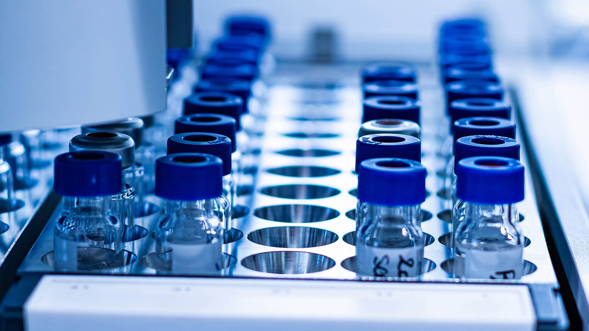 HPLC glass vials in the rack at analytical pharma laboratory