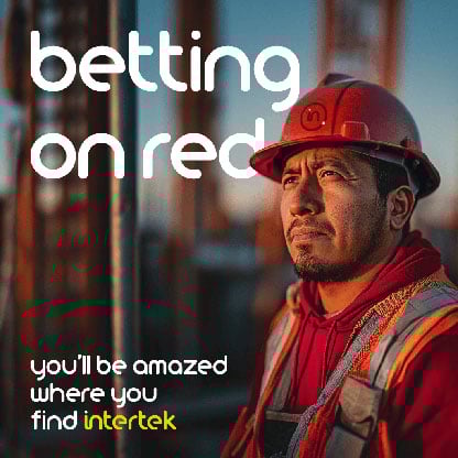 Industrial worker wearing red PPE