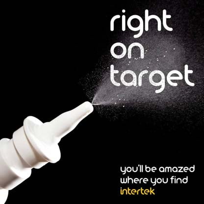 A nasal spray blowing fine mist into the air