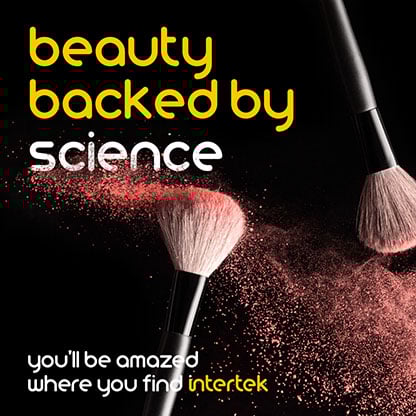 A pair of brushes moving through makeup powder